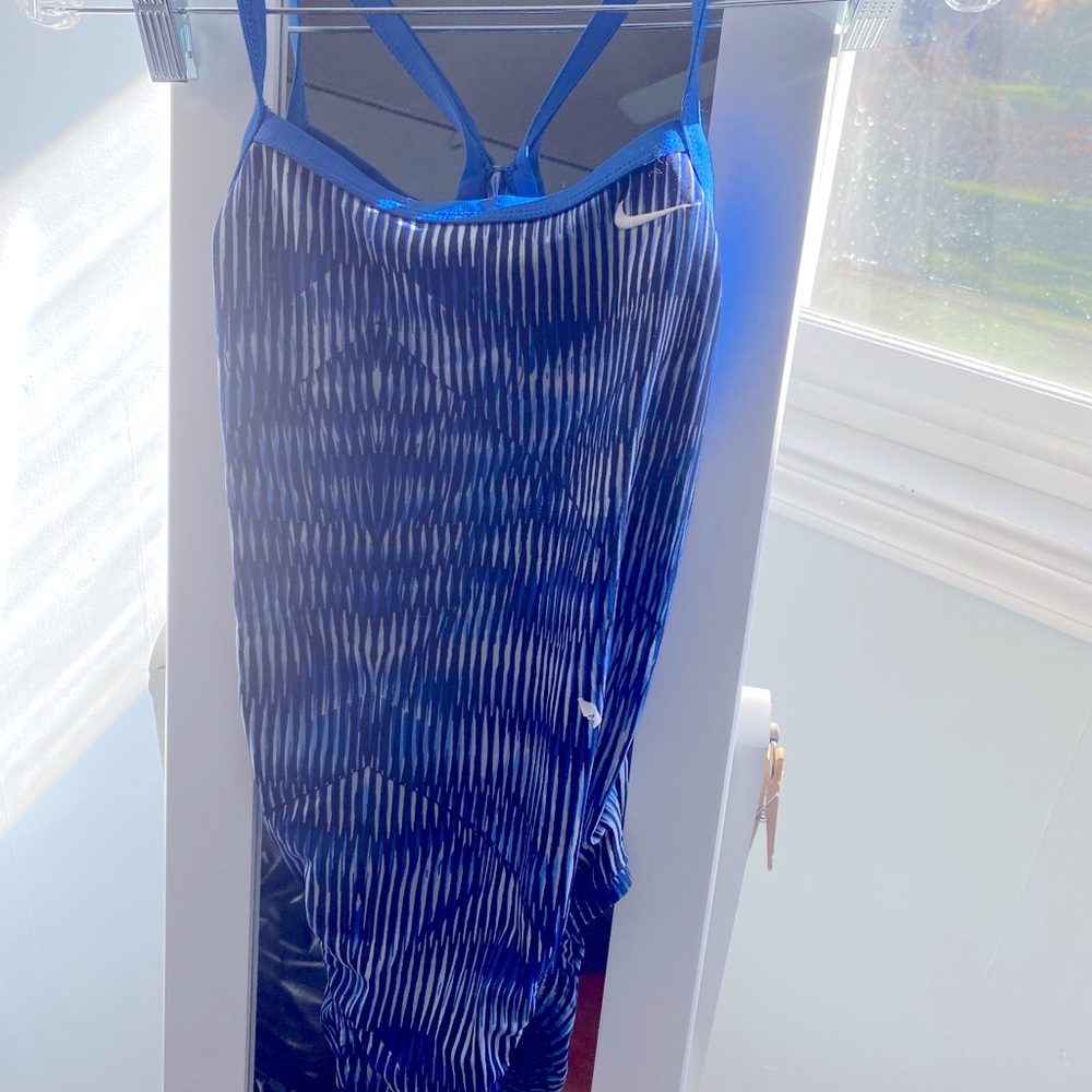 Excellent Nike Practice or Racing Suit Size 30, worn only a few times.